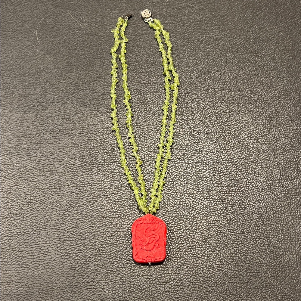 Hand carved cinnabar and peridot necklace